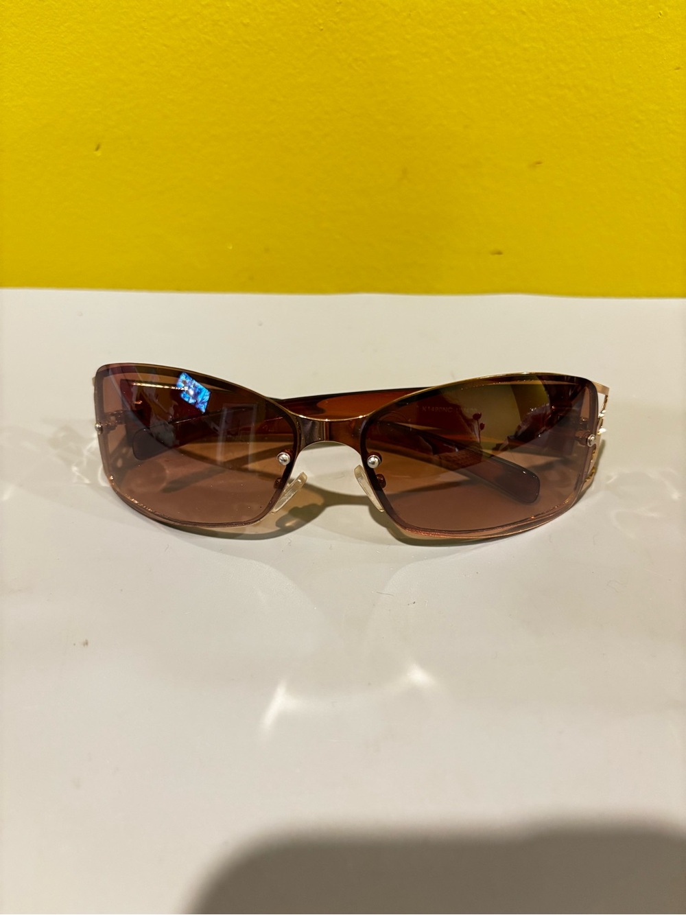 Women's Brown Rimless Sunglasses - Stylish UV Shades